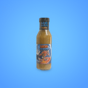 2 oz bottle of Heatwave Hotsauce Mango flavor, featuring a bright tropical label with a fiery mango design, perfect for adding sweet and spicy Caribbean flavor to any dish.