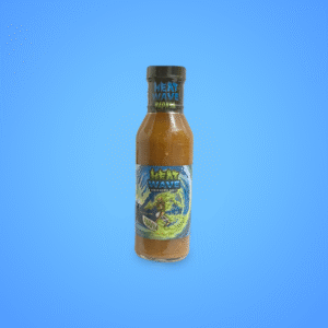 12 oz bottle of Heatwave Hotsauce Papaya flavor, featuring a colorful tropical label with papaya imagery, offering a sweet and spicy Caribbean-style hot sauce experience.